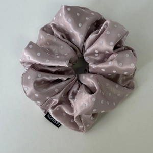Dusty pink polka dot satin scrunchie with fashion label for elegant women's hairstyles