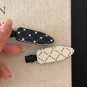 Elegant checkered hair clips set with white rhinestones and black alloy base for daily styling
