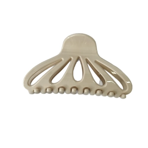 Minimalist large fan-shaped hollow hair claw clip in nude resin for elegant hair styling