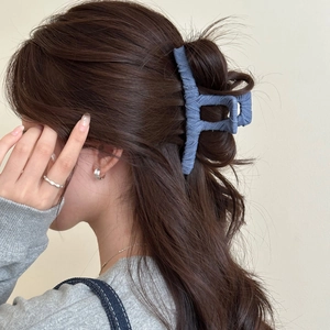 Elegant denim fabric wrapped large square hair claw clip for a stylish back bun look
