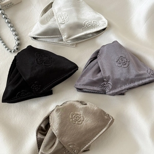 Elegant shell hair claw clip with embossed rose floral design in four satin colors