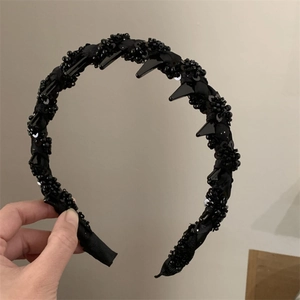 Gothic black beaded headband with sequin accents and geometric spikes for high crown styling