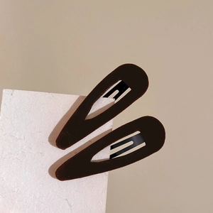 Elegant pair of dark brown velvet waterdrop BB hair clips on minimalist paper card