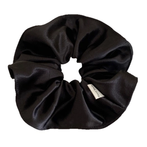 Elegant black satin scrunchie with silky finish and Hand Made woven label for women