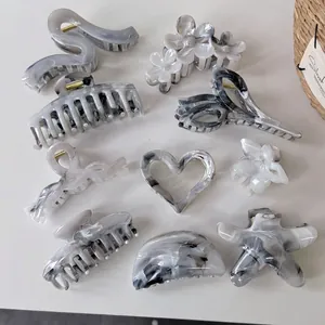 Lot de pinces à cheveux à texture marbrée incluant des formes étoile et cœur