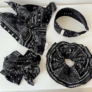 Retro navy paisley print hair accessory set with headband, scrunchie and bow clip