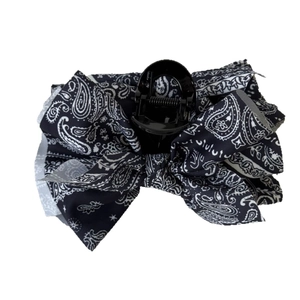 Navy blue paisley print fabric bow hair claw clip with vintage aesthetic on white background