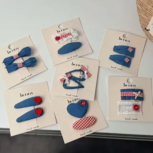 Denim blue and red heart hair clip set with lace bows for girls on display card