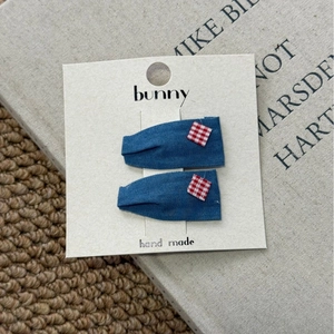 Handmade denim blue hair clips for girls featuring cute red and white gingham hearts