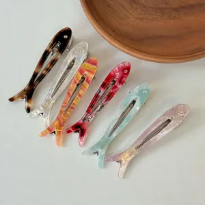 Set of 6 colorful fish-shaped acetate duckbill hair clips with sparkling rhinestone details