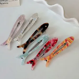 Set of 6 colorful fish-shaped acetate hair clips with shell patterns and duckbill grip