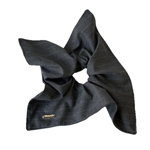 Elegant dark grey striped fabric scrunchie with a gold handmade metal tag for women