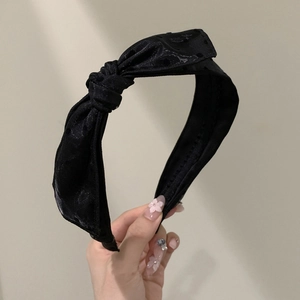 Elegant black french polka dot bow headband with jacquard satin texture for women