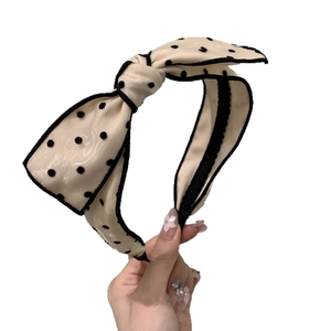French style beige polka dot headband with large bow tie accessory for women