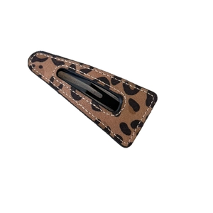 Vintage leopard print hair clip with matte texture and contrast stitching for women