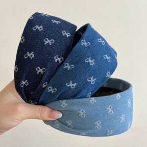 Tre cerchietti per capelli in denim con fiocco in varie tonalità di blu alla moda