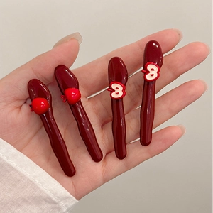 Set of four glossy dark red apple hair clips featuring full and sliced apple designs
