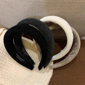 Classic ribbed sponge padded headbands in black, white and tan colors for women