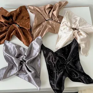 Five-piece set of large satin scrunchies with rhinestones in earth tones and black