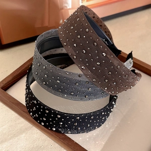Elegant studded headband set in black and brown fabric with non-slip inner teeth