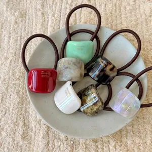 Set of 7 colorful curved resin hair ties with high elastic brown braided rope