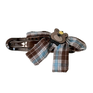 Cute brown plaid bow hair clip with cartoon bear ornament on high-quality plastic base