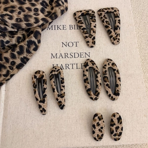 8-piece set of leopard print fabric hair clips in various shapes for y2k styling