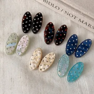 Barrettes élégantes en acétate avec strass dans divers coloris et motifs marbrés