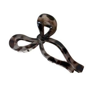 Elegant retro leopard print bow hair claw clip with glossy acetate finish for women