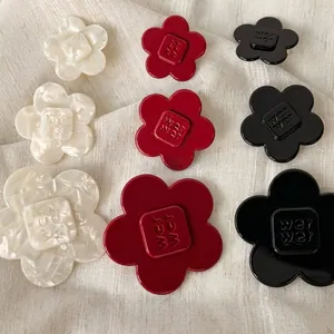 Acetic acid floral hair clips in white, red and black with wer wer engraving detail