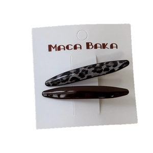 Retro leopard print and coffee brown duckbill hair clips set for women on white card