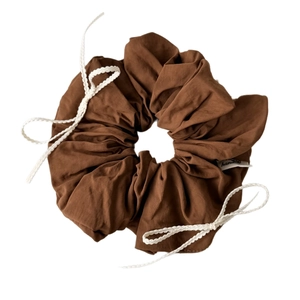 Brown cotton scrunchie with white woven bows and minimalist style for hair