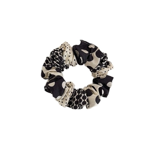 Chic black and white polka dot pleated fabric scrunchie for hair styling