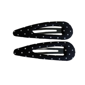 Classic black and white polka dot fabric covered snap clips set in teardrop shape
