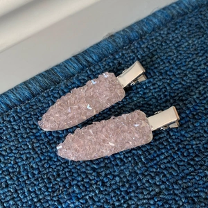 Pair of sparkling light pink crushed stone hair clips with silver metal duckbill base
