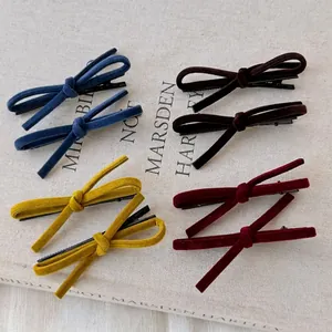 Four pairs of vintage velvet bow hair clips in navy, brown, yellow and wine red colors