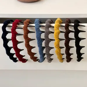 Set of 8 colorful velvet headbands with teeth in wine red, navy blue, and earthy tones