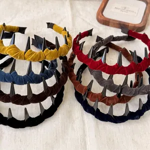 Set of colorful velvet headbands with plastic spikes in various stylish autumn colors