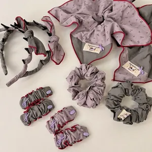 Floral patchwork hair accessories set with gray purple scrunchies and bow headband