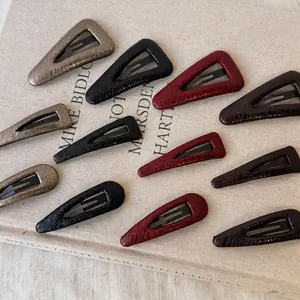 Set of 12 geometric faux leather BB hair clips in vintage snakeskin and matte finishes