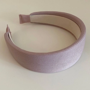 Pink ribbed fabric wide headband with high crown sponge padding and non-slip lining