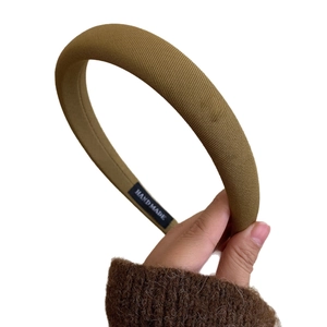 Classic khaki padded headband with handmade label for high cranial top hair style