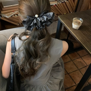 Barrette nœud élégante en tulle noir à pois avec perle pour cheveux de femme