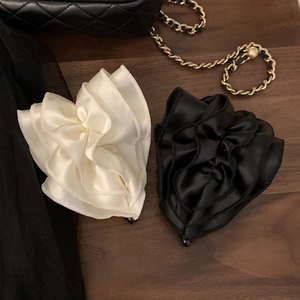 Elegant satin teardrop banana hair clips with pleated fabric flowers in white and black