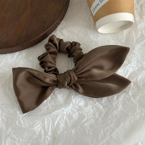 Elegant coffee brown satin scrunchie with large asymmetrical bow for women's hairstyles