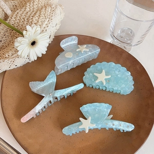 Set di mollette per capelli a conchiglia e stella marina blu chiaro effetto marmo