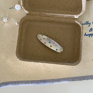 Silver brushed metal hair clip with colorful polka dots in a natural gift box