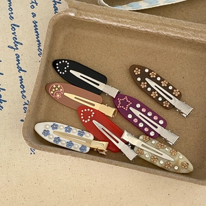 Set of 7 French style acetate hair clips with rhinestones in various retro colors