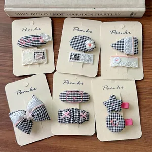 6-piece black and white checkered bow hair clips set for girls on display cards