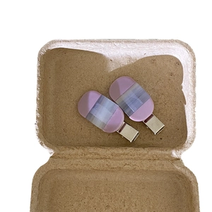 Minimalist purple acetate hair clips set with iridescent texture in a brown gift box